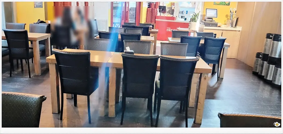 Pizza restaurant hall with several tables