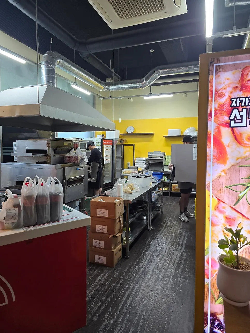 Open kitchen cooking area visible to customers