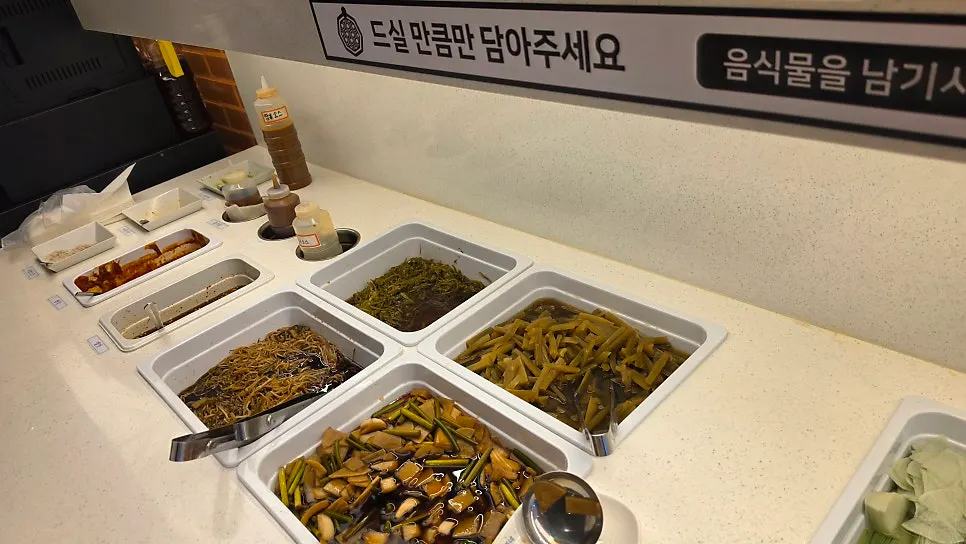 Plate of side dishes gathered from the self-serve bar