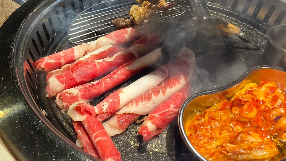 Close-up of meat on the grill