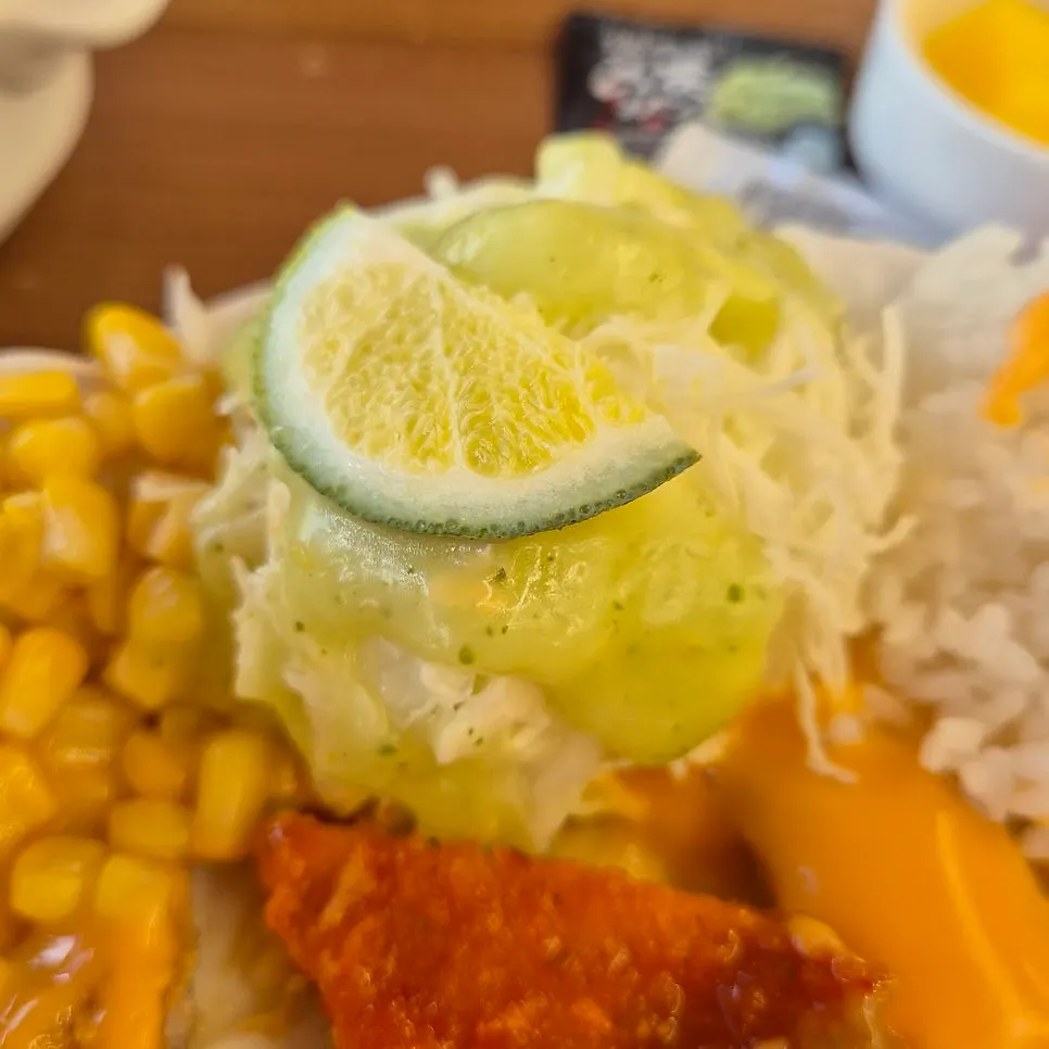 Cabbage salad topped with green citron sauce