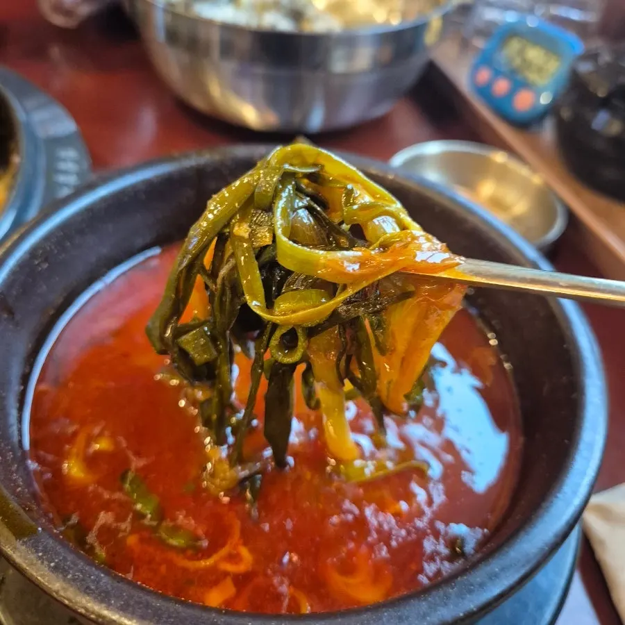 Haejangguk broth with sujebi and green onion kimchi