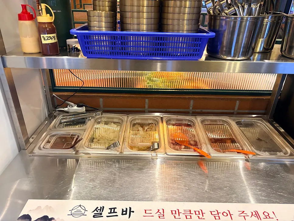 Pickles and sauce set on the table