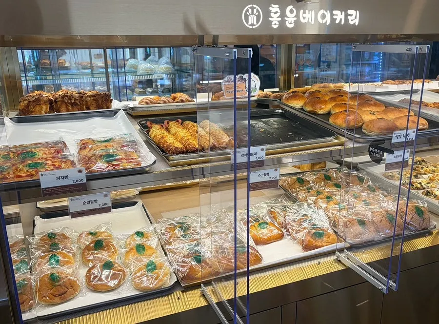 Various breads inside the glass case