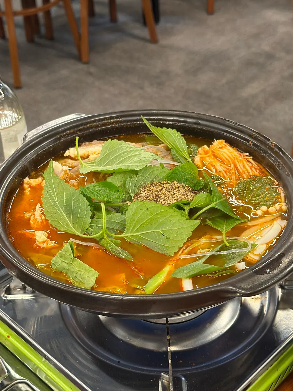 Spicy gopchang hot pot loaded with ingredients