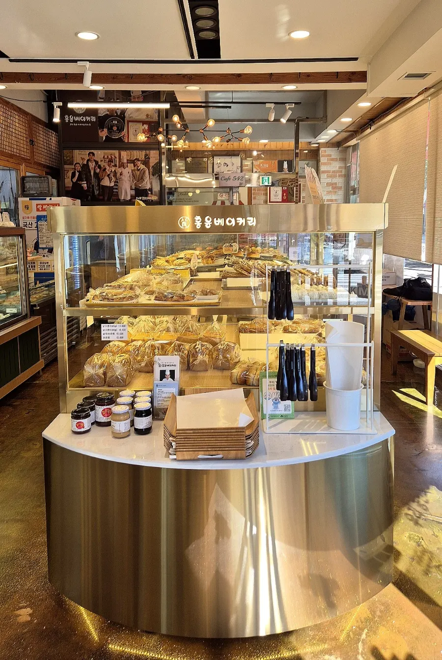 Shop interior with a display of assorted breads
