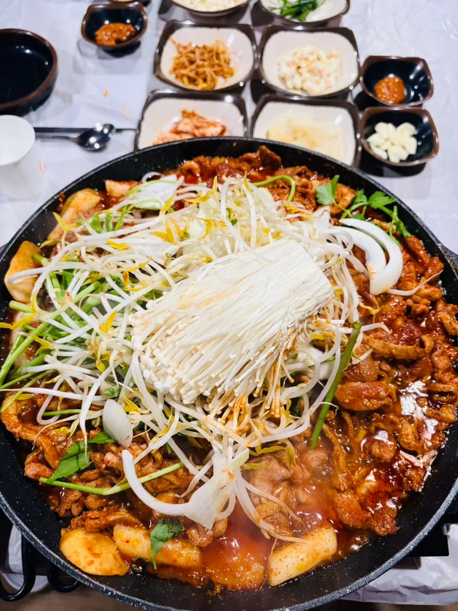 Crisp beansprouts alongside duck meat