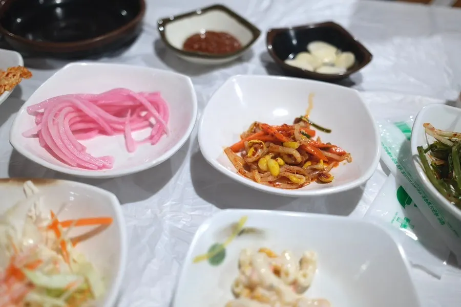 A bowl of garlic and ssamjang dipping sauce