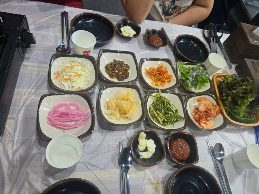 Basic side dish spread with lettuce, garlic and ssamjang