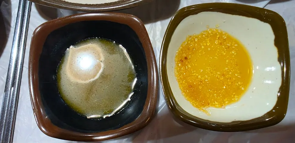 Two sauces: sesame oil salt sauce and mustard sauce