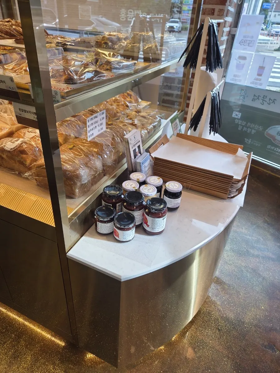 Display of snacks including madeleines and cookies