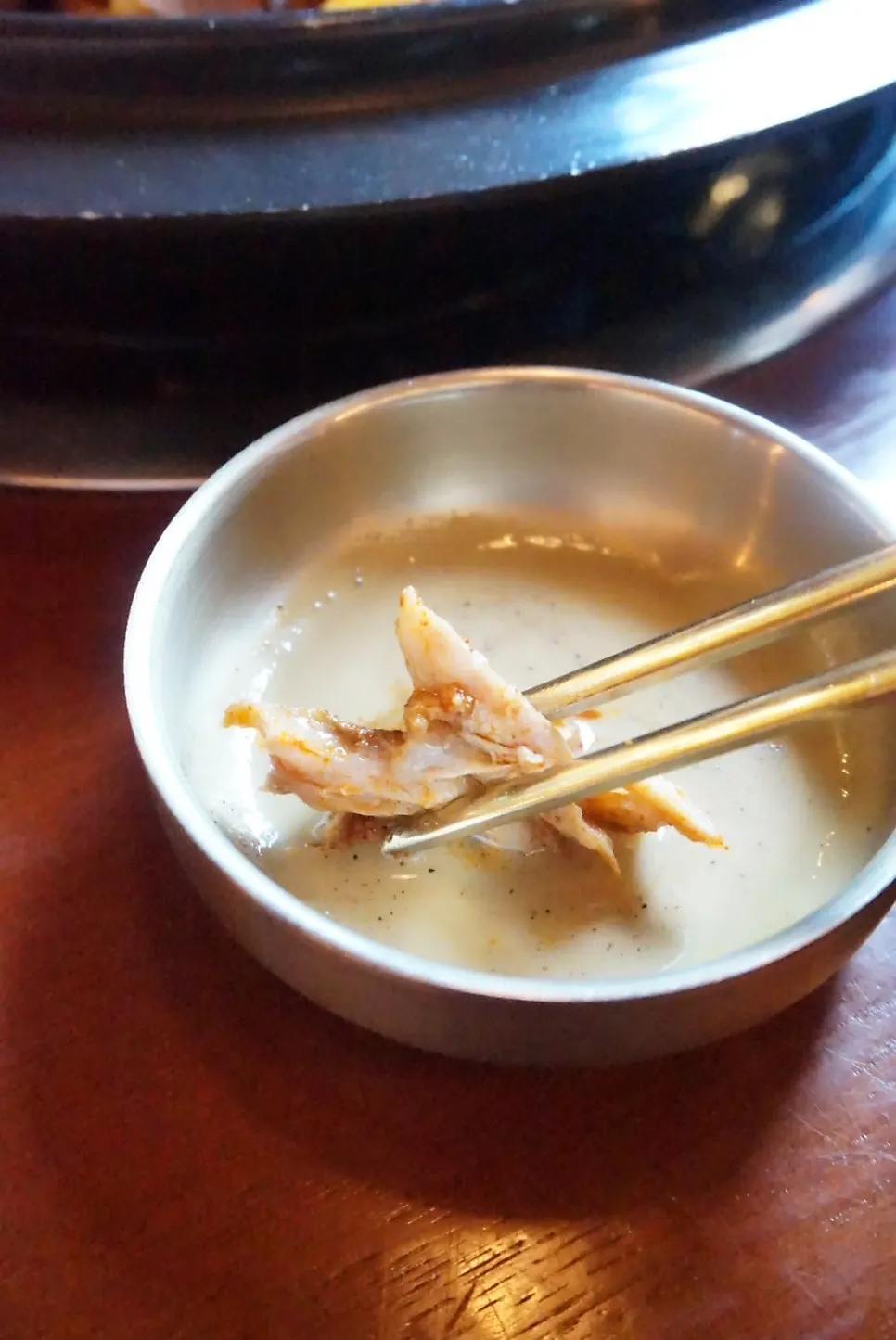 Gamjatang meat dipped in the special sauce