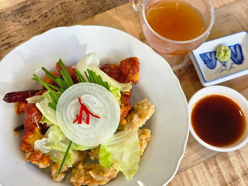 Tangsuyuk served with salad and vegetables on the side