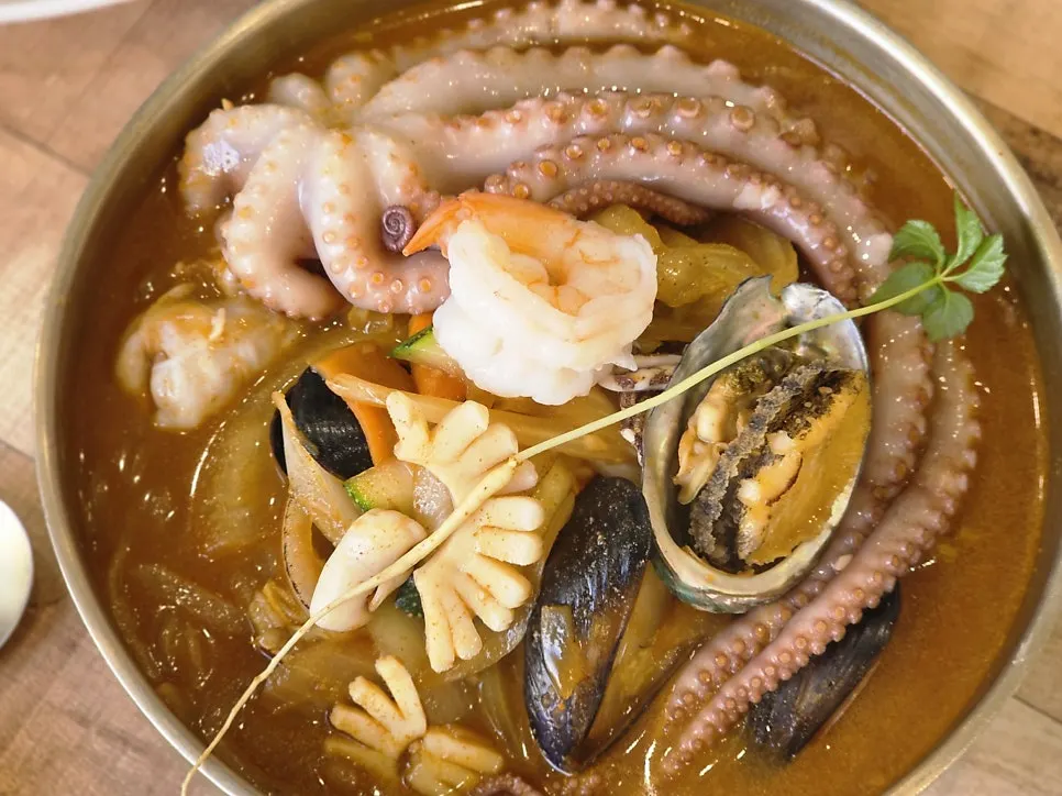 Octopus abalone jjambbong piled high with ingredients