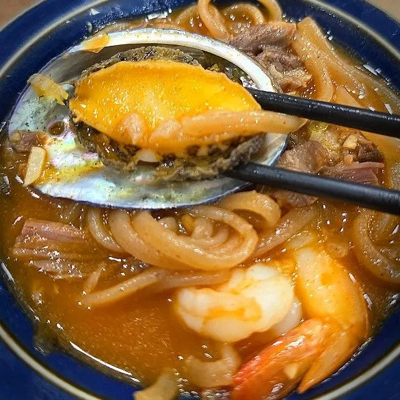 A bowl of ganalbi abalone jjambbong with herbal broth