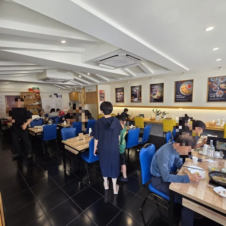 The interior of Gupo Jjambbong packed with customers