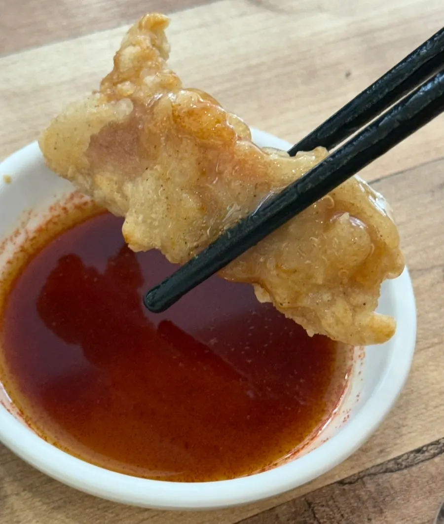 Cross-section of a piece of sweet and sour pork