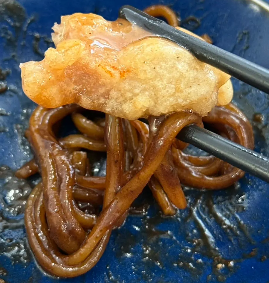 Sichuan sweet and sour pork served with cabbage