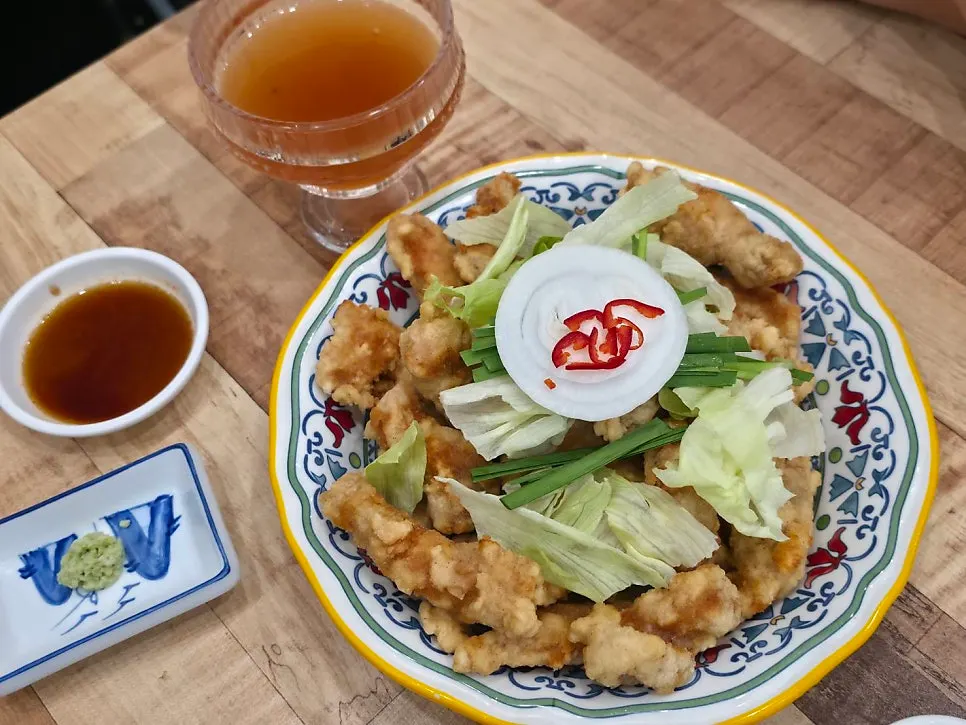 Table set with basic side dishes and sanghwang mushroom tea