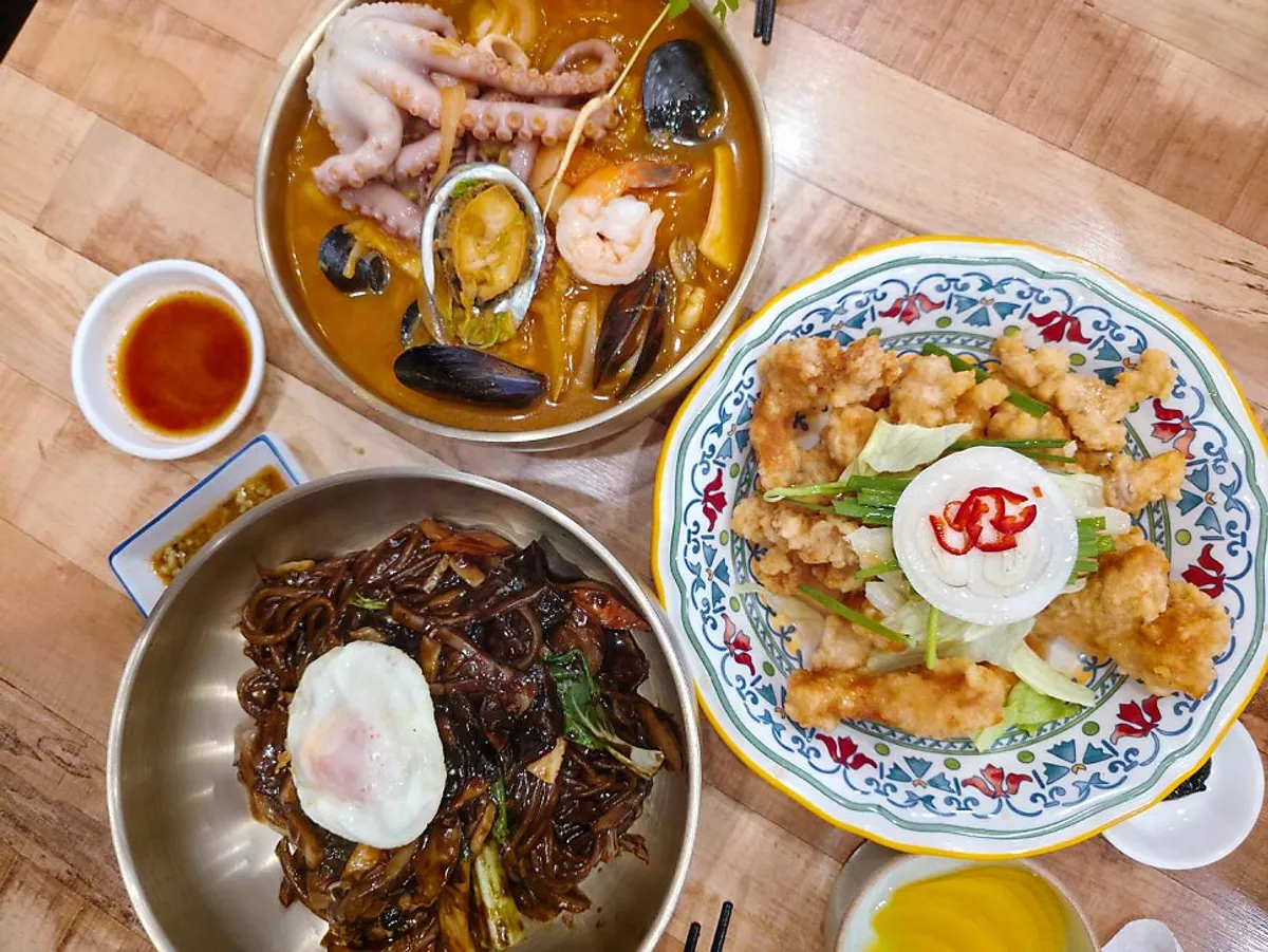 Healing sanghwang sweet potato stem jjambbong topped with octopus and abalone