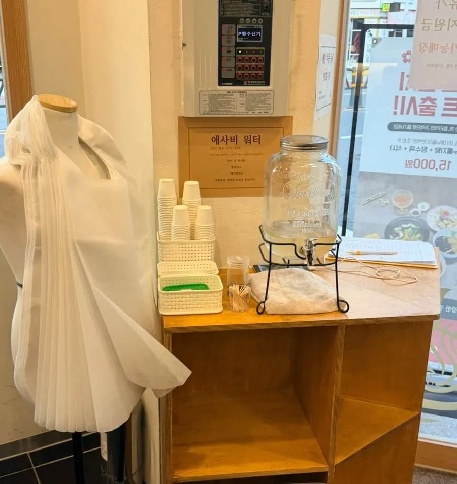 Self-serve water station near the entrance