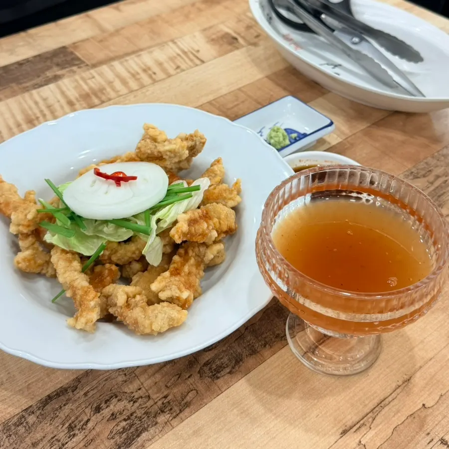 Tangsuyuk topped with vegetables and sauce
