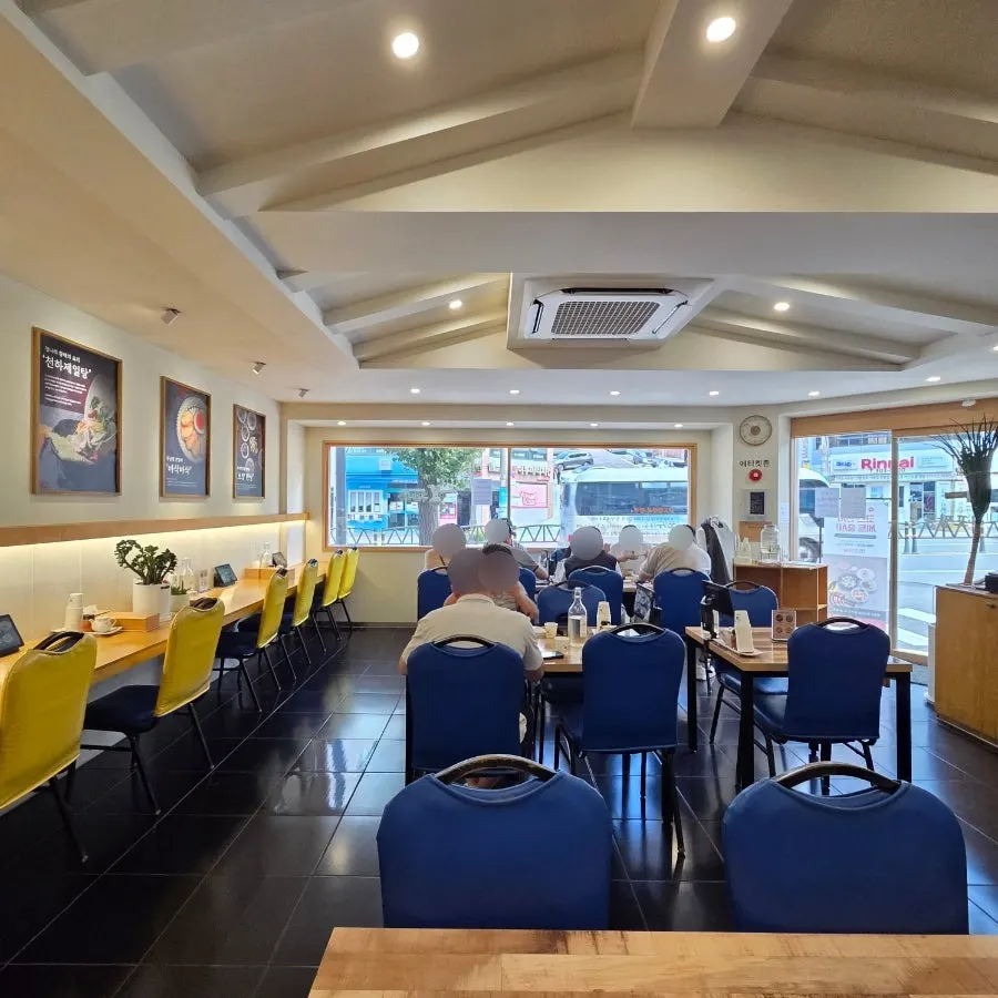 Interior with blue and yellow accent chairs