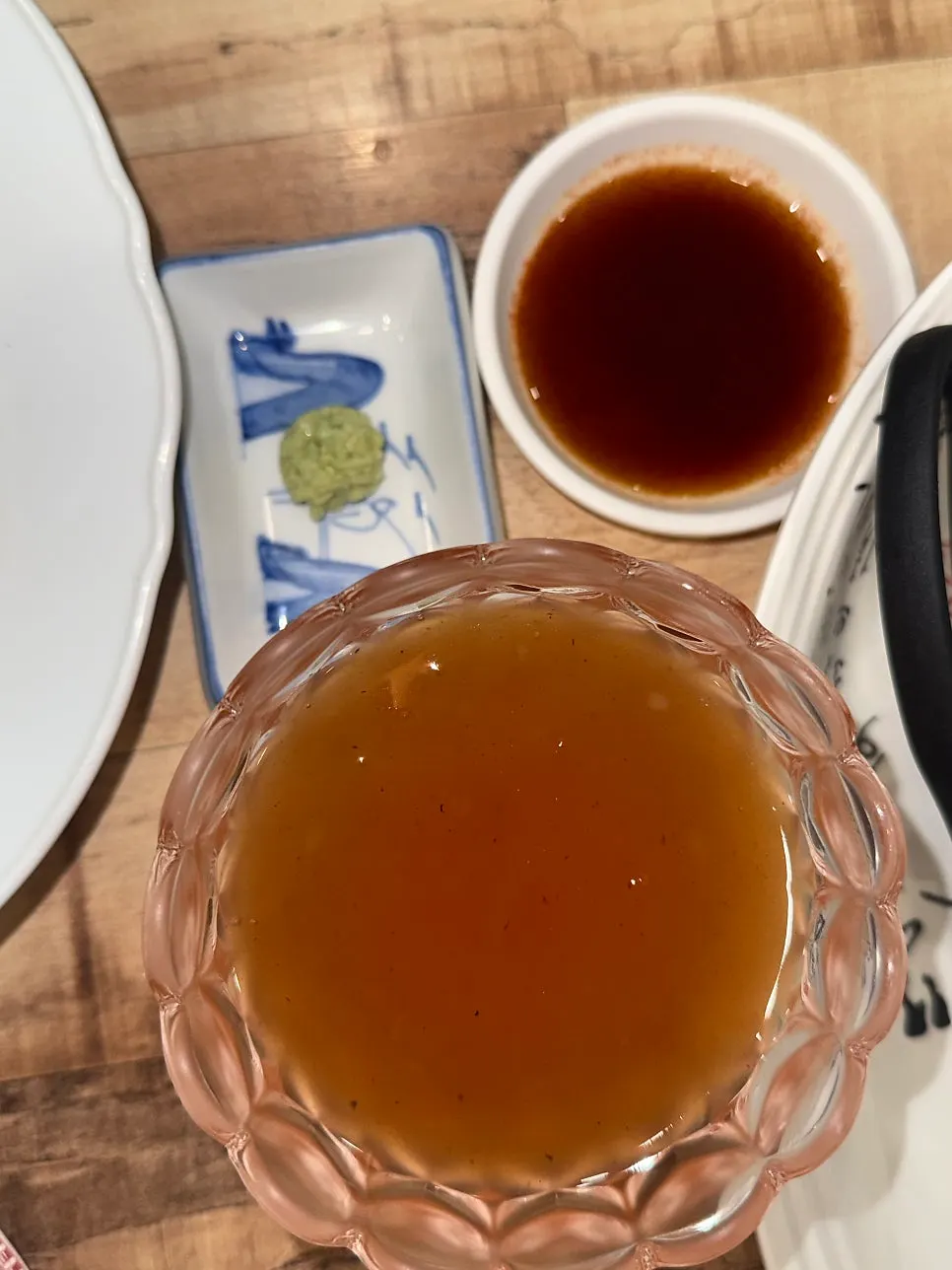 Tangsuyuk served with sauce, wasabi, and soy sauce