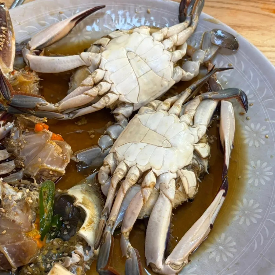 Fried egg served alongside the crab