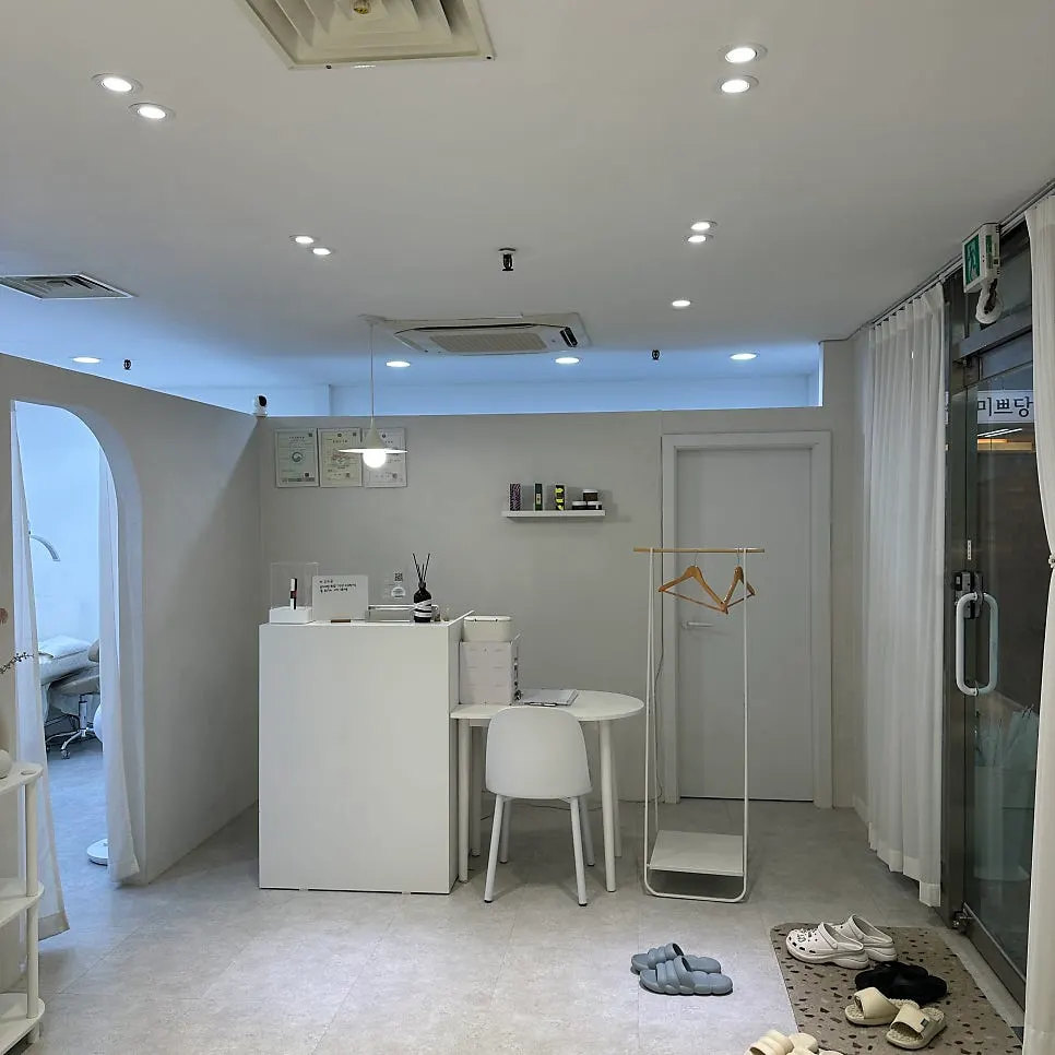 Interior of the store decorated in white tones