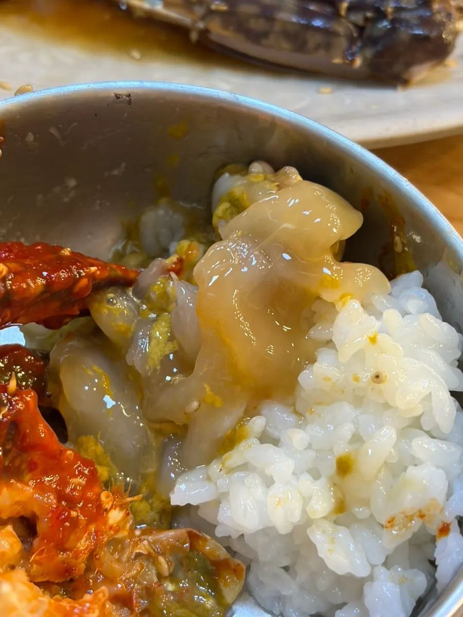 Spicy marinated crab with fried eggs