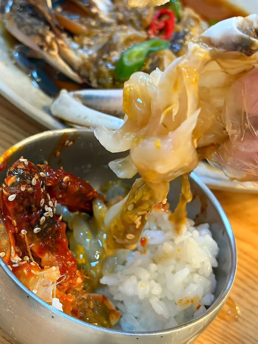Crab shell filled with rice and flying-fish roe