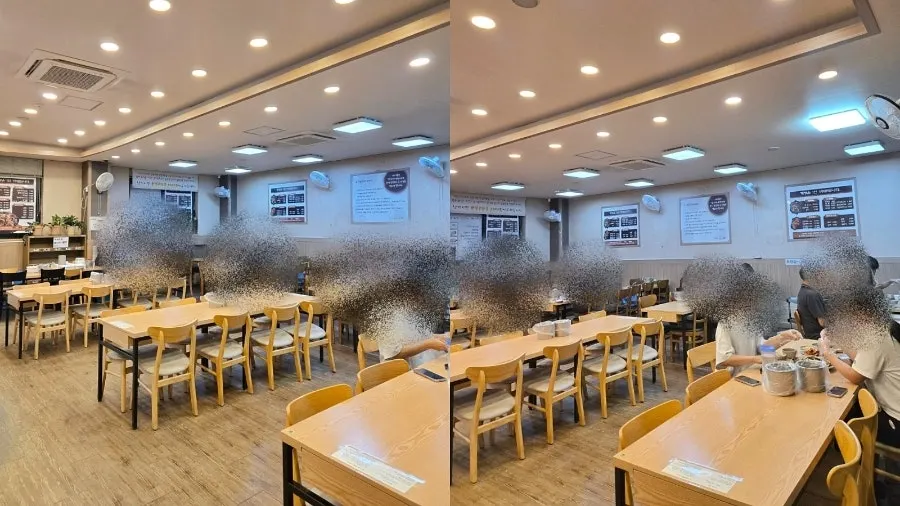 Spacious restaurant interior with well-spaced tables
