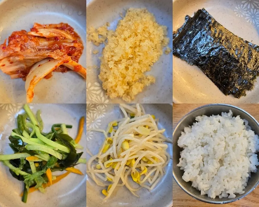 Basic side dishes of kimchi, bean sprouts, flying fish roe, and seaweed