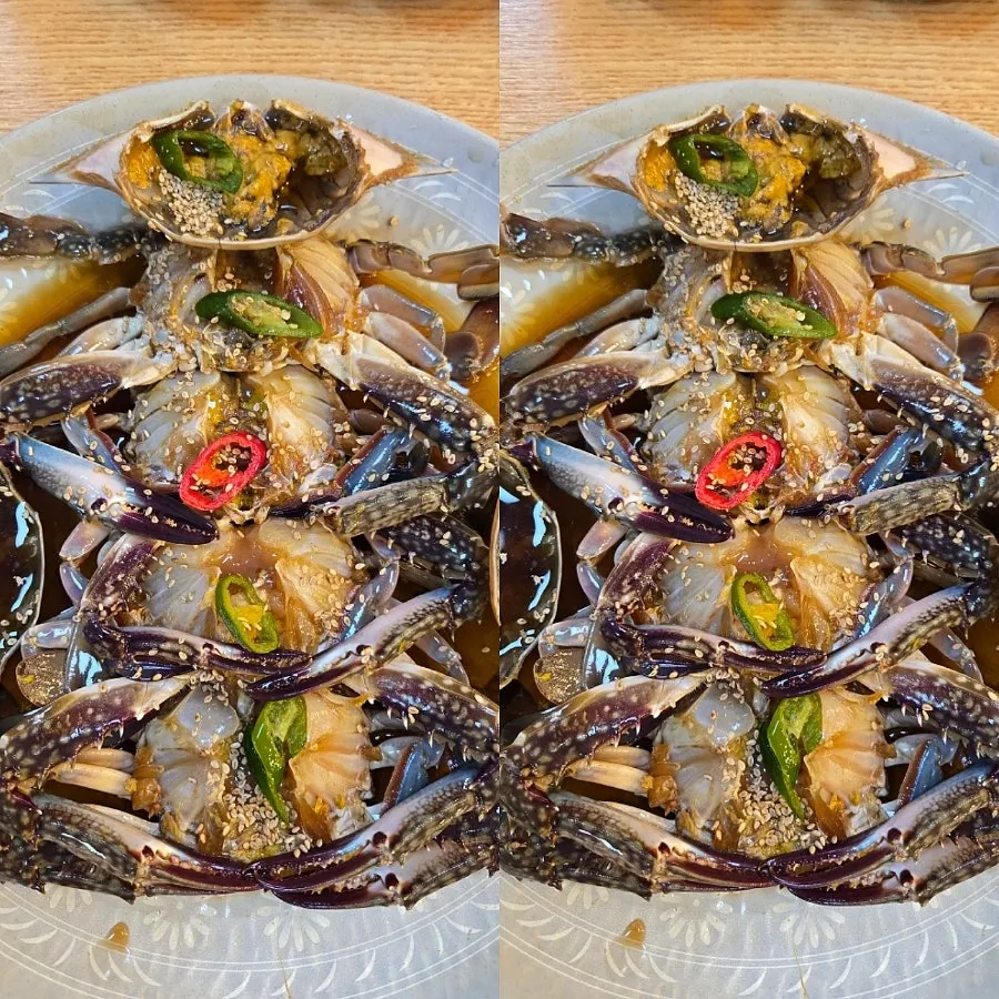 Putting on disposable gloves before eating the crab