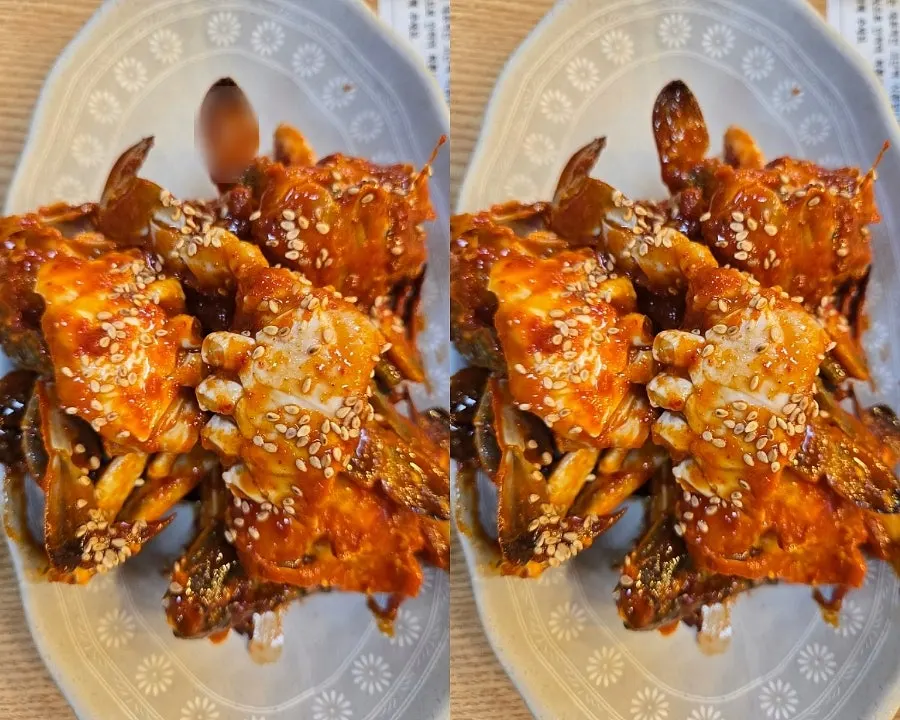 Soy-marinated crab and spicy marinated crab together on the table
