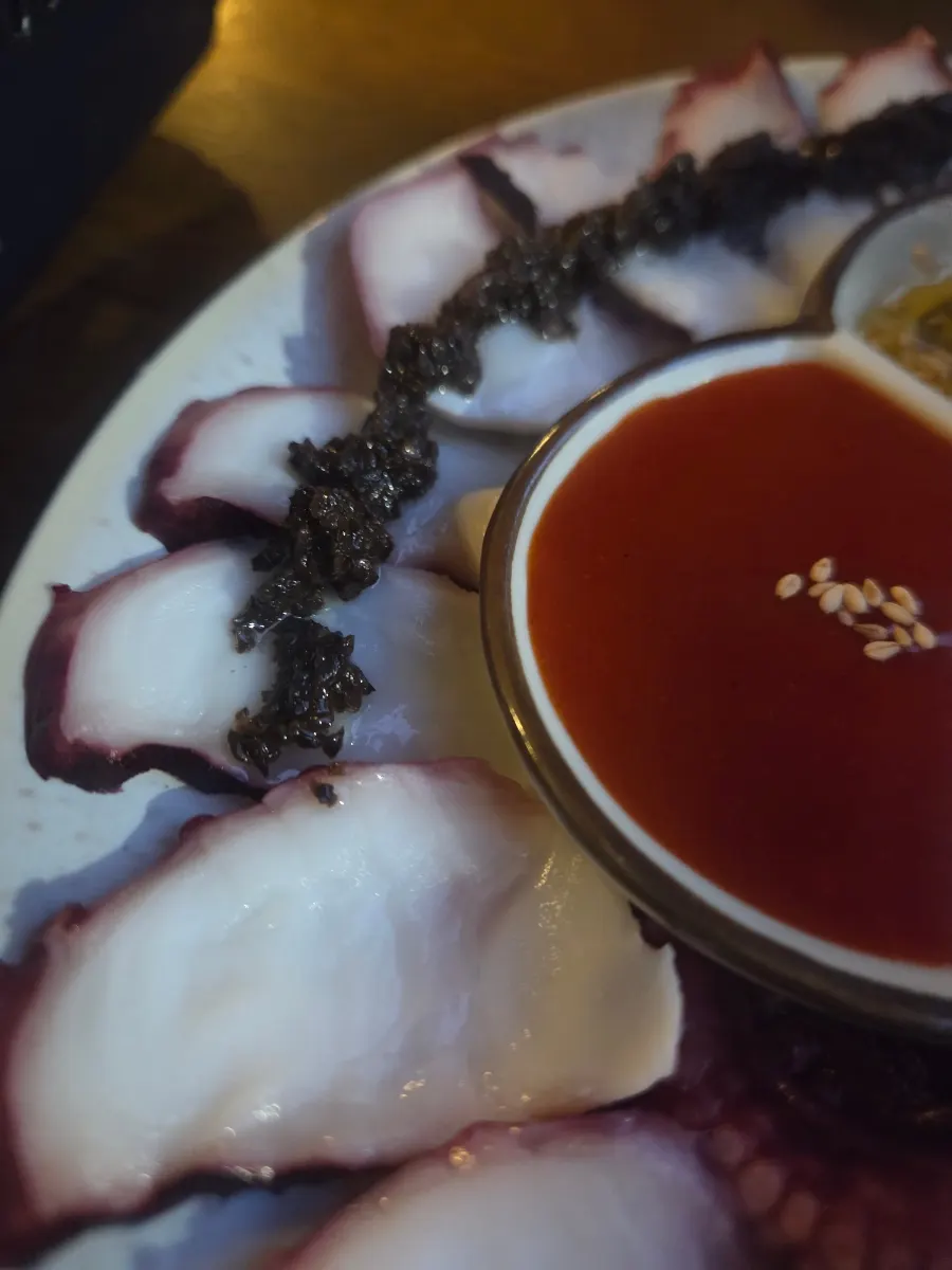 Boiled octopus dipped in sauce