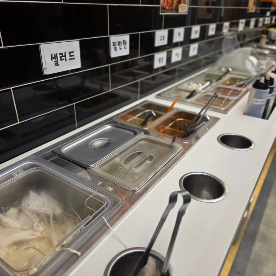 Chicken and other side items from the self-serve bar
