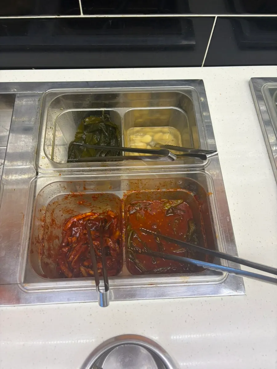 Vegetable corner at the self-bar with bean sprouts and mushrooms
