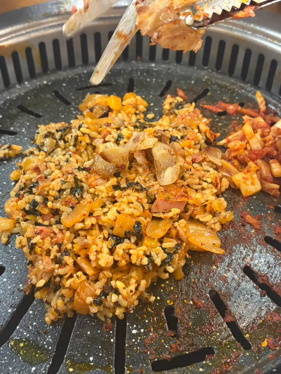 Pan-fried rice crisped up on the grill to finish the meal