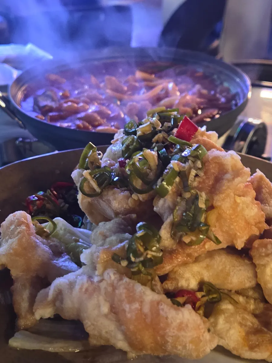 Boneless chicken feet in broth and yuringi set on the table