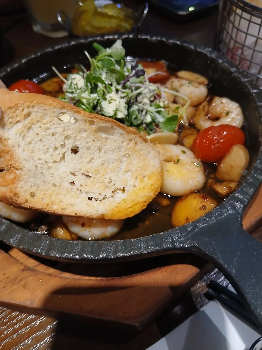 Toasted baguette bread served in its own basket