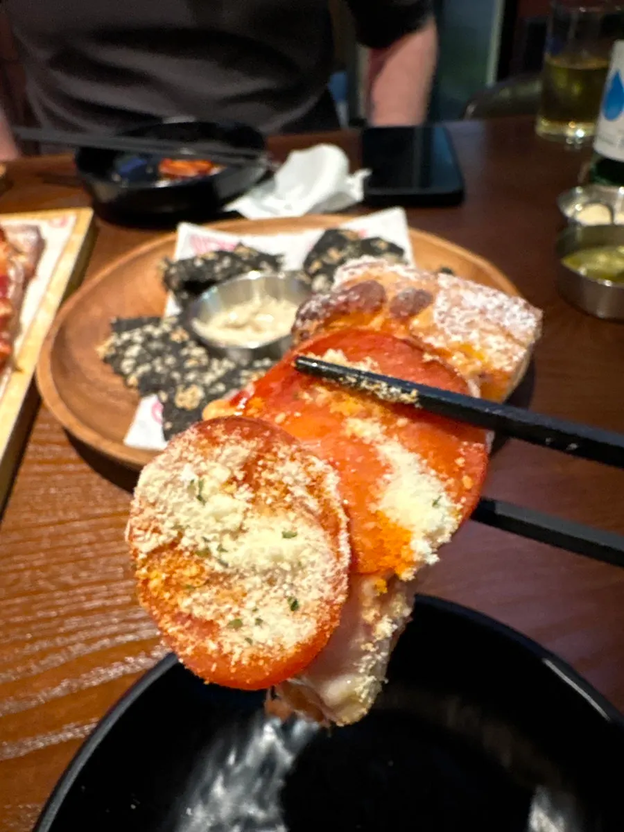 Close-up of pepperoni-topped pizza