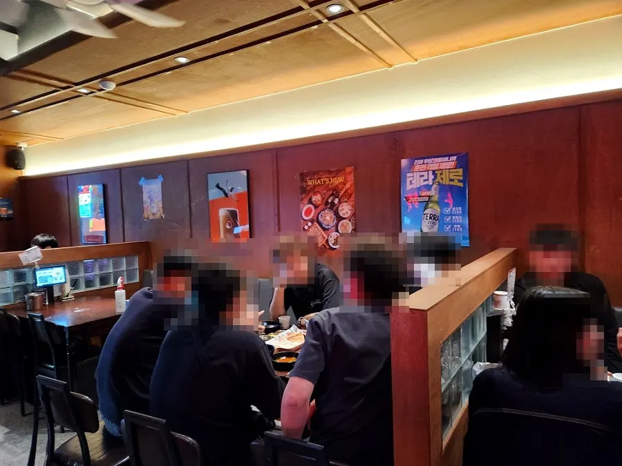 View of Monthly Beer tables full of customers