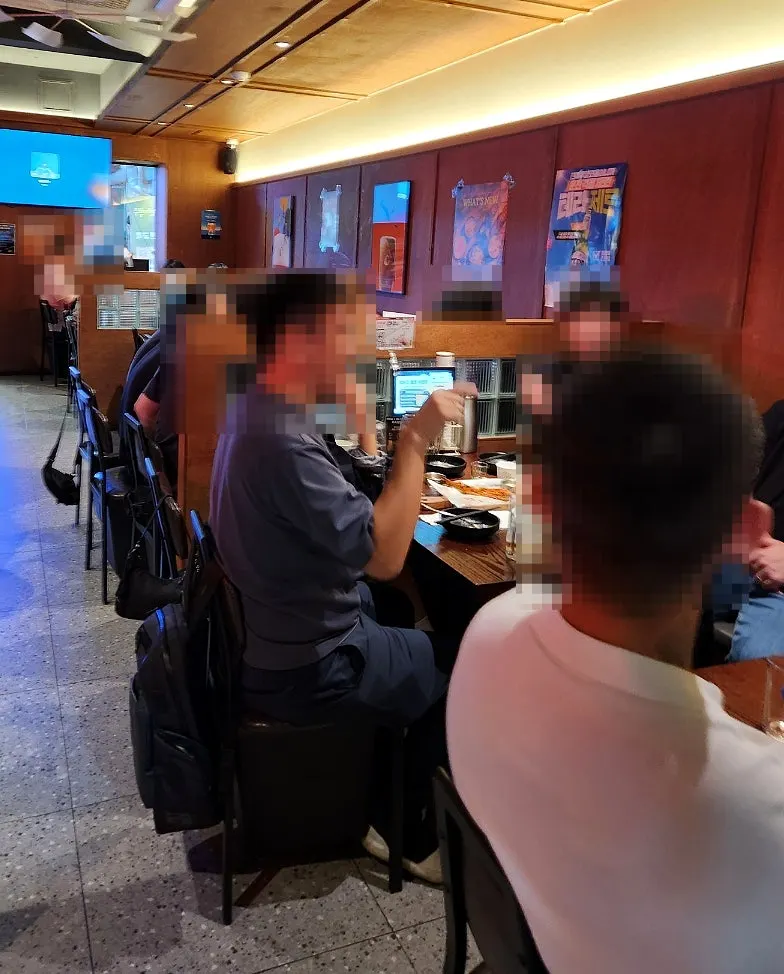 Lively interior of Monthly Beer bar