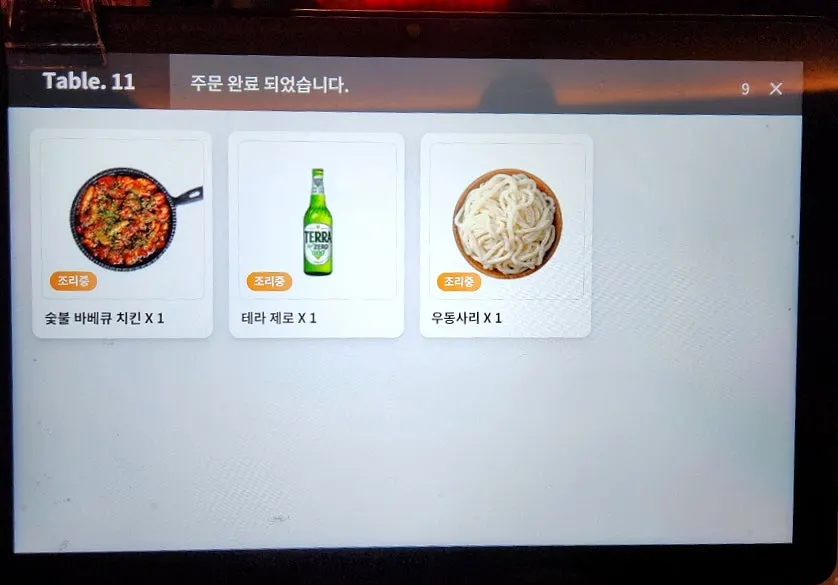 Menu listing the signature charcoal BBQ chicken