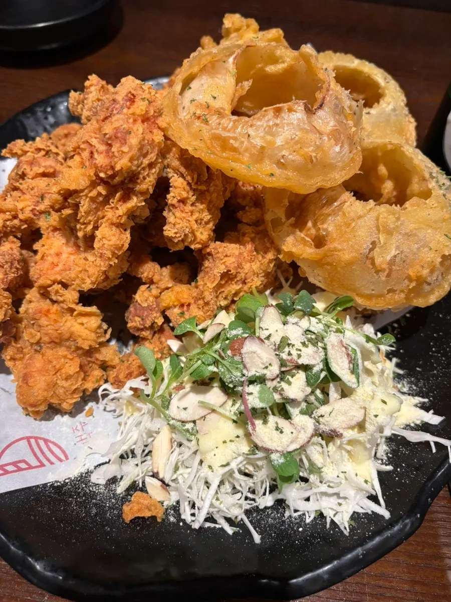 A generous plate of crispy fried chicken