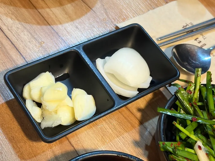 Garlic and onion served alongside the meal