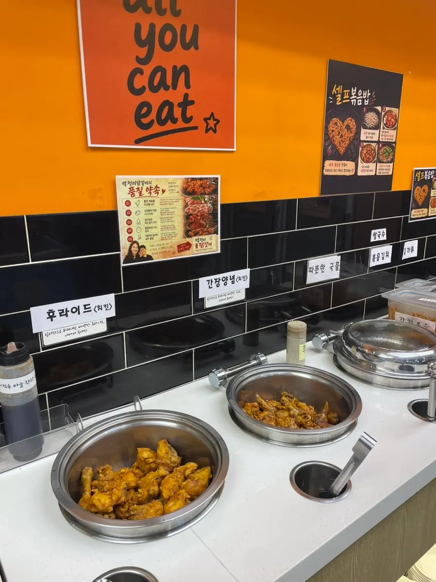 Chicken, chicken soup, and noodle add-ins at the self-serve bar