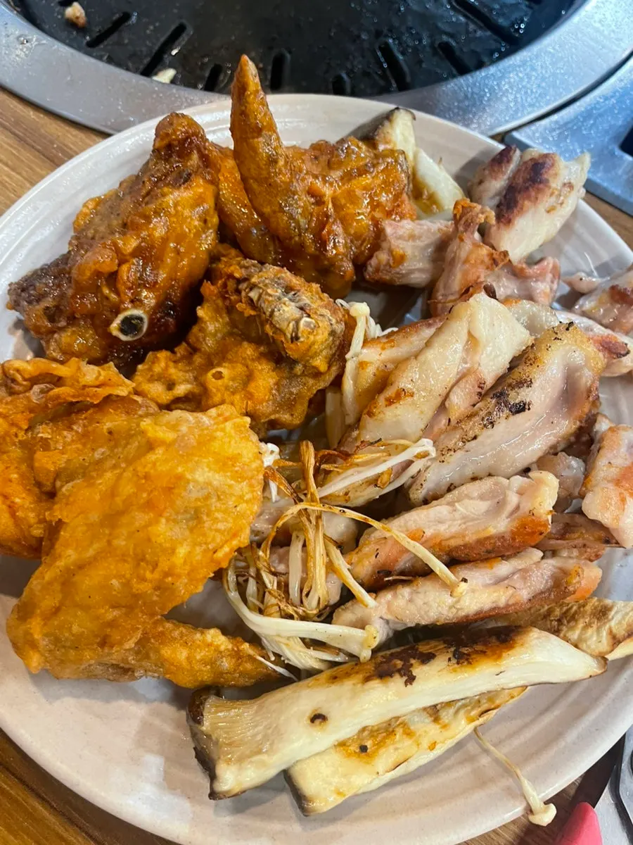 A plate of fried chicken and soy chicken